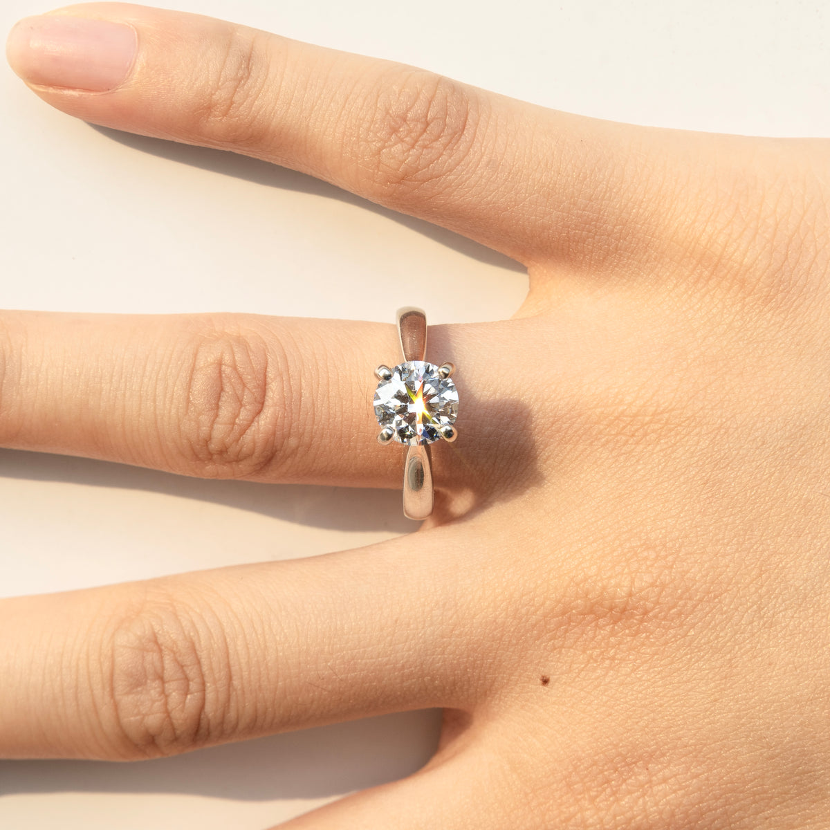 Minimal 4-Prong Round Brilliant Engagement Ring
