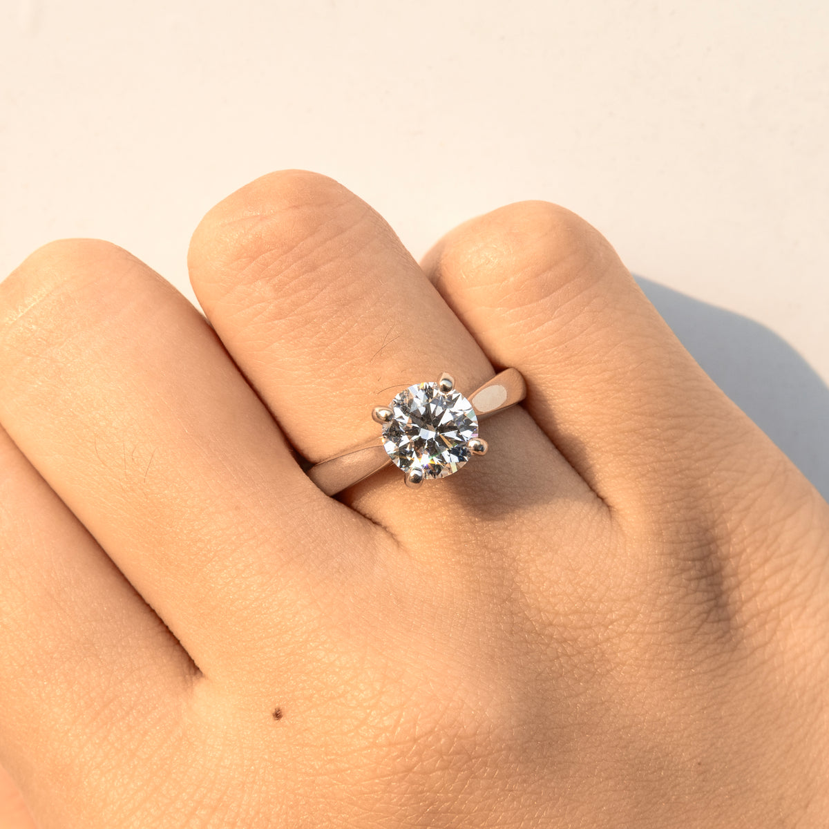 Minimal 4-Prong Round Brilliant Engagement Ring